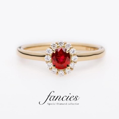 美しいピジョンブラッドルビー＆ダイヤモンドのへイロ―デザインの婚約指輪です