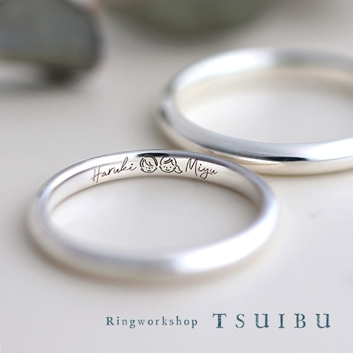 人気の「手書き印字」のオプションで似顔絵を印字した結婚指輪