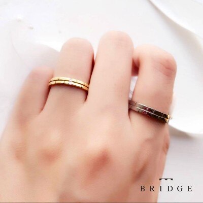オシャレでかわいい人気の個性的なデザイン結婚指輪 Decision 決意 結婚指輪 Id Bridge ブリッジ銀座アントワープブリリアントギャラリー マイナビウエディング